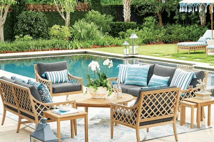 patio furniture by an in-ground pool