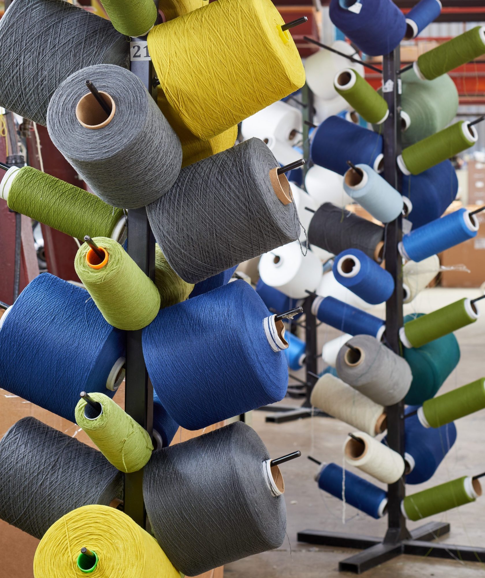 spools of different color yarn
